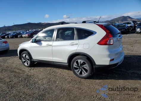 2015 Honda Cr-V Touring z USA, uszkodzony, nr VIN 5J6RM4H91FL019924